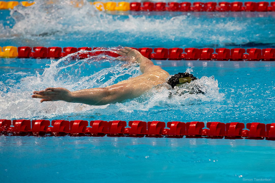 Swimmer at the London Aquatics Centre, Queen Elizabeth Olympic Park. Aquatics GB Swimming Championships 2025. Movement photographer Simon Tomkinson.