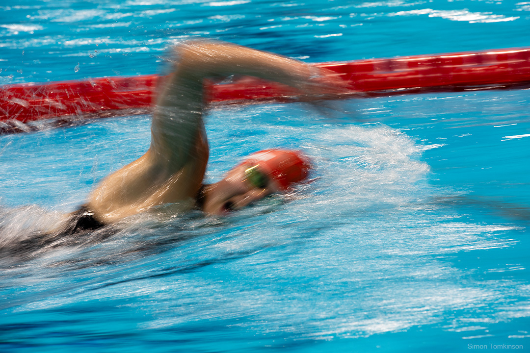 Swimmer at the London Aquatics Centre, Queen Elizabeth Olympic Park. Aquatics GB Swimming Championships 2025. Movement photographer Simon Tomkinson.