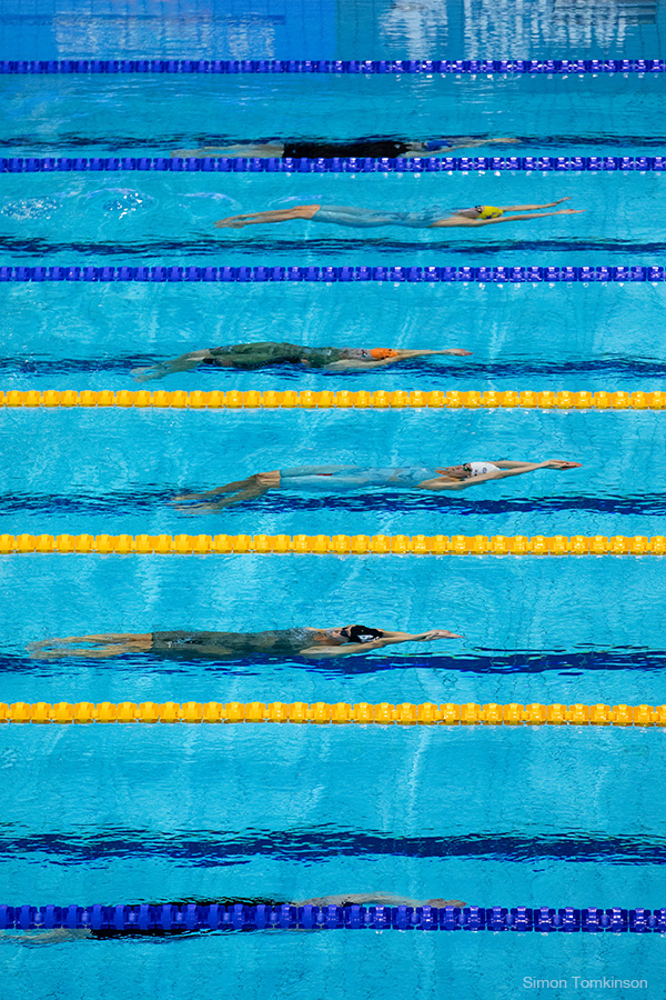 Swimmers at the London Aquatics Centre, Queen Elizabeth Olympic Park. Aquatics GB Swimming Championships 2025. Movement photographer Simon Tomkinson.