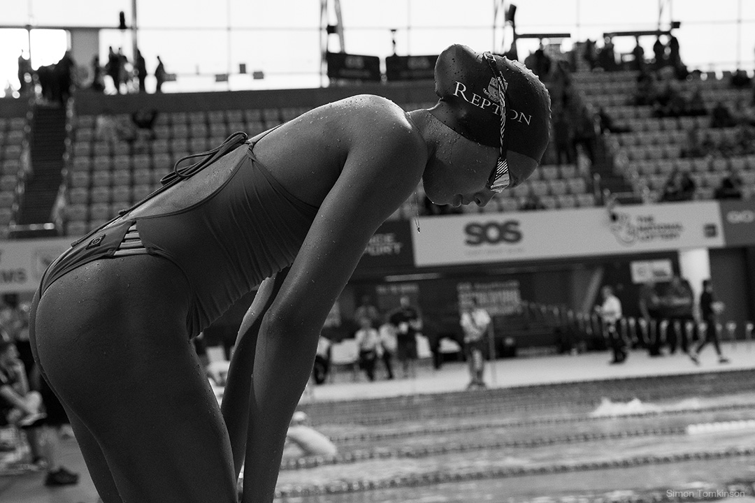 Swimmer at the London Aquatics Centre, Queen Elizabeth Olympic Park. Training session during Aquatics GB Swimming Championships 2025. Movement photographer Simon Tomkinson.
