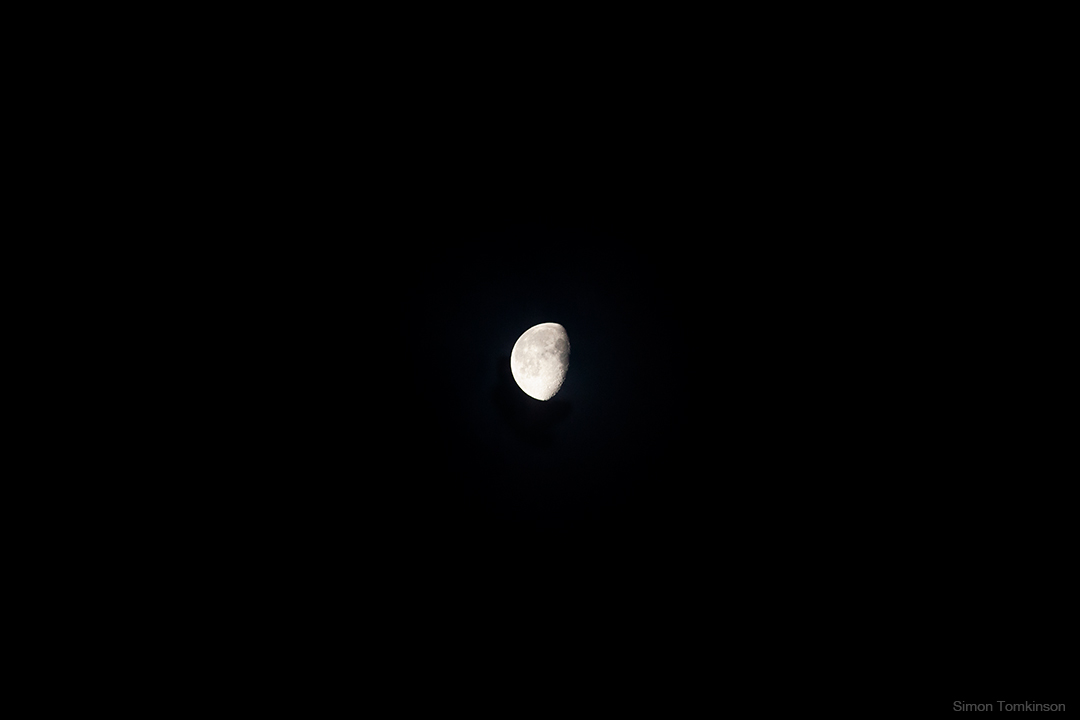 Gibbous moon over Poole Bay on the south coast of England. Photographer Simon Tomkinson.