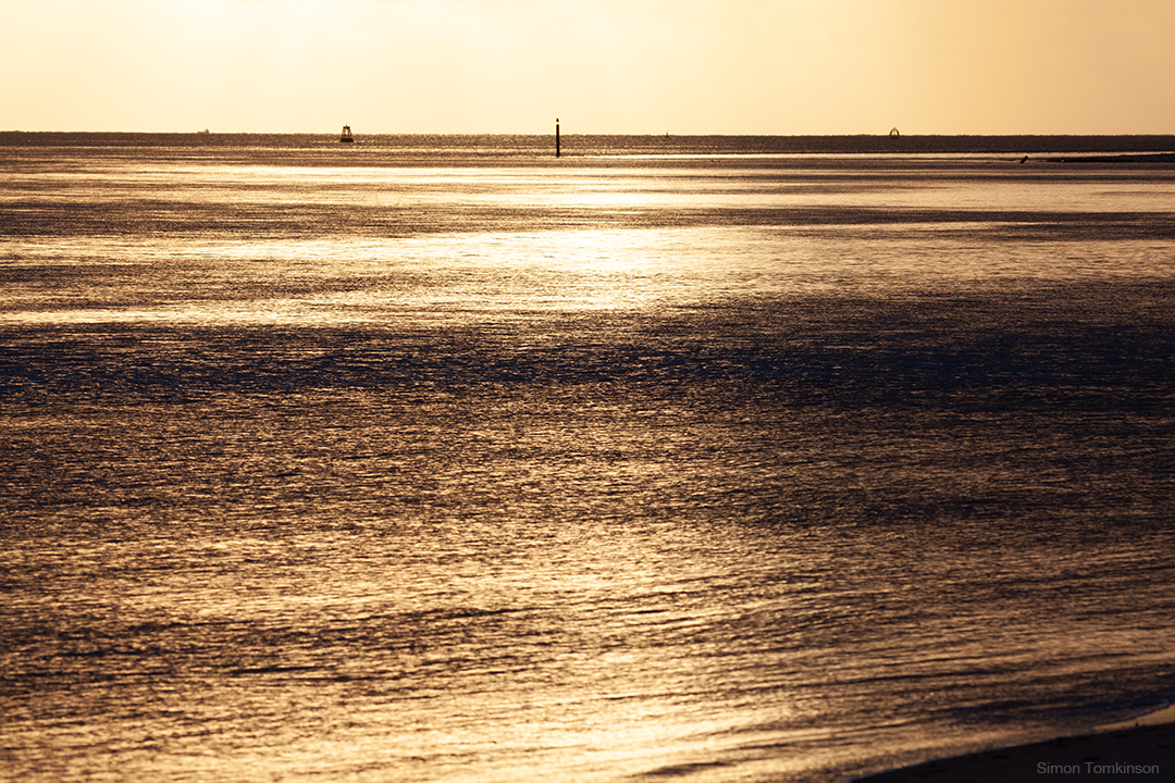 Winter's morning sun on Poole Bay, England. Photographer Simon Tomkinson.